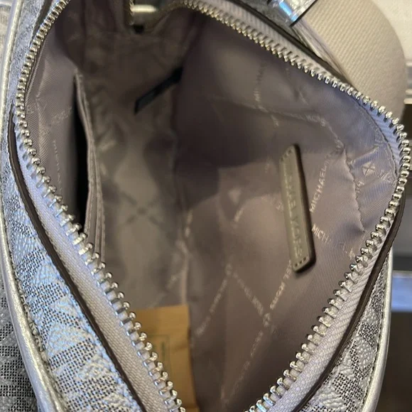 Michael Kors Bradshaw Extra-Sm Metallic Signature Logo Camera Crossbody
Silver - Picture 10 of 16
